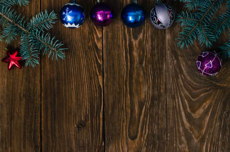 Branches of blue spruce and Christmas toys.の写真素材