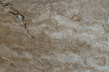 Texture marble stone brown beige closeup. Background of the marble