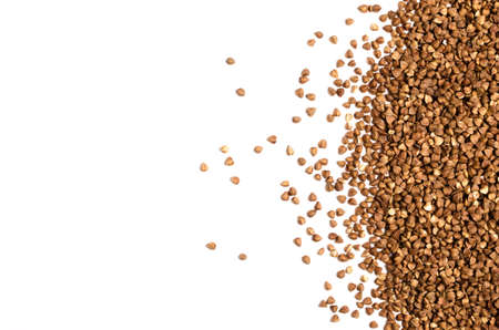 Scattering of buckwheat on a white background closeupの写真素材