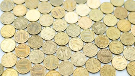 Large number of coins face value of one tenge closeup