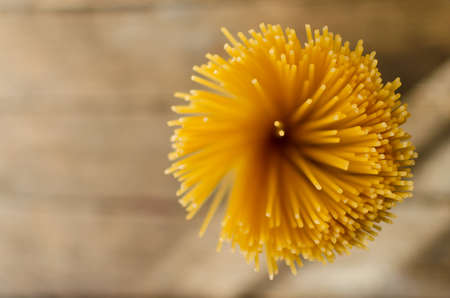 Uncooked spaghetti top view close up horizontal photoの写真素材