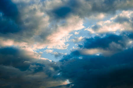 Storm clouds against a bright blue sky.Approaching storm front.