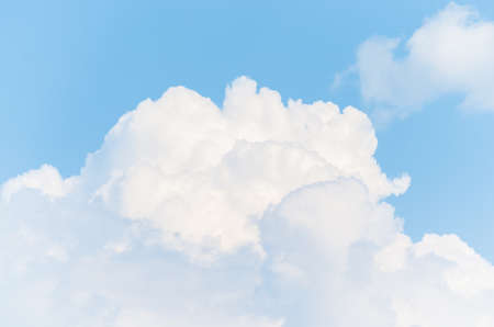 White cumulonimbus clouds on blue sky background..Deterioration of weather conditions.の写真素材