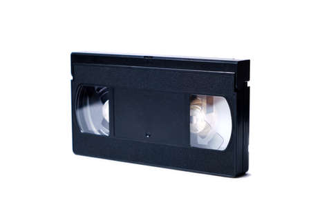 Retro videotape on white background, close-up isolate.の写真素材