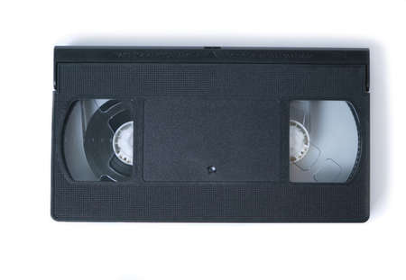 Retro videotape on white background, close-up isolate.の写真素材