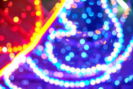 Abstract Christmas background, bokeh of colorful garlands.