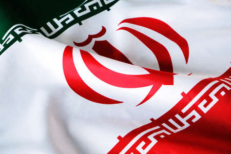 National flag of Iran close-up in daylight
