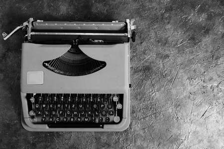 Old, vintage, typewriter in black and white image. The view from the top
