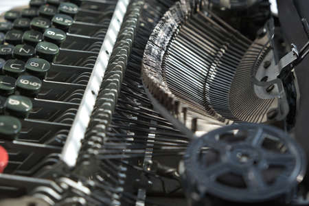 Mechanism and keyboard of an old typewriter with film coilの写真素材