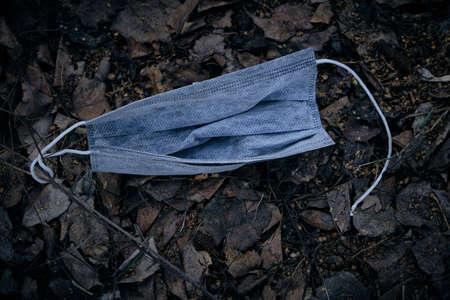 Discarded used medical mask. Exacerbations of the epidemic situation, viruses