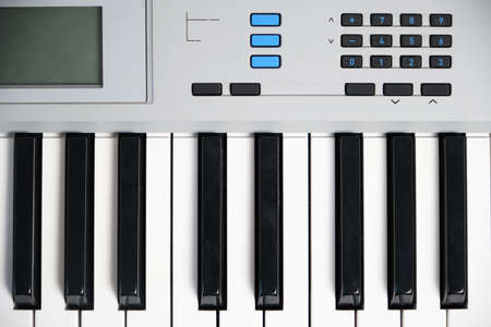 Keys and control panel of the music synthesizer