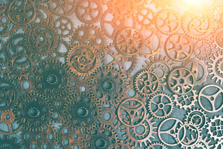 Gears, abstract background with sunlight, a lot of small rusty gears, steampunkの写真素材