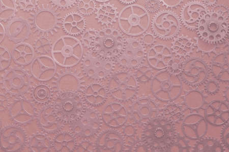 Gears, abstract background, lots of little gears with a pastel pink tinge, steampunkの写真素材