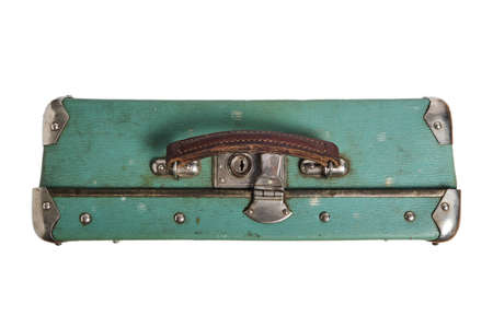 Old, green, vintage retro suitcase with leather handle and metal rivets and corners. On white background, isolate.の写真素材