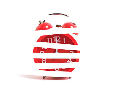 Red alarm clock is isolated on a white background, shows twelve clock, night and lunch timeの写真素材