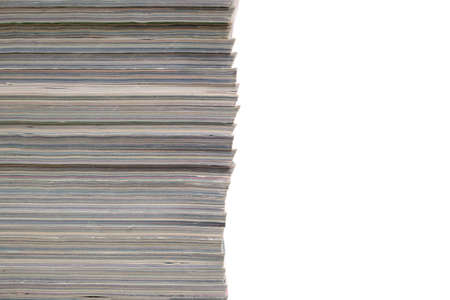 Stack of magazines and newspapers on a white background