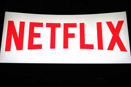 Kostanay, Kazakhstan, November 23, 2021. NETFLIX logo is an American entertainment company, a service for streaming movies and TV series on the monitor screenのeditorial素材