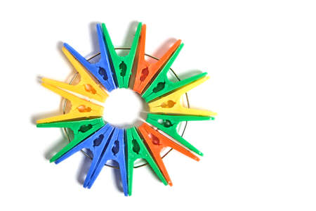 Multicolored clothespins on a white background, isolateの写真素材