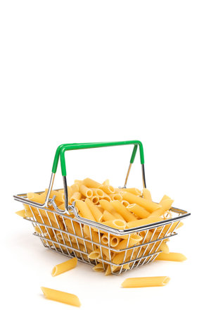 Pasta, flour product in shopping basket on white background.Concept purchasing foodの写真素材