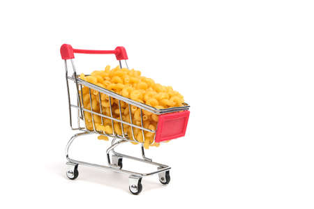 Cart shopping with pasta on a white backgroundの写真素材