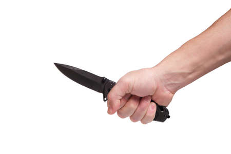 Tactical folding knife in bare hand on white background.Assault and self defense