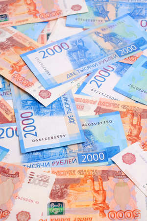 Background, Russian rubles banknotes in denominations of two and five thousand rublesの写真素材
