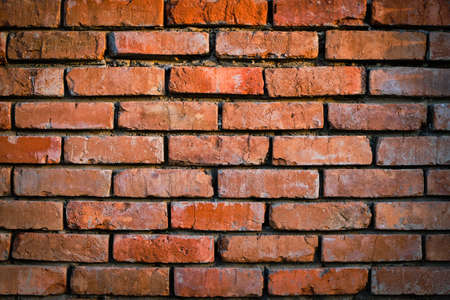 Background is wall old red burnt brick