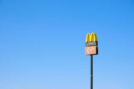 Kazakhstan, Kostanay, May 11, 2022, signboard with McDonald's logo is an American chain restaurants operating field public cateringのeditorial素材