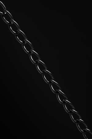 Nickel plated metal chain black backgroundの写真素材