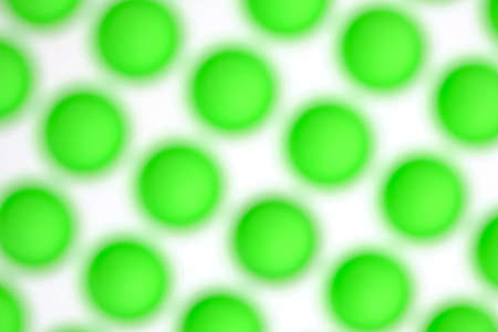 Abstract blurred background with green balls