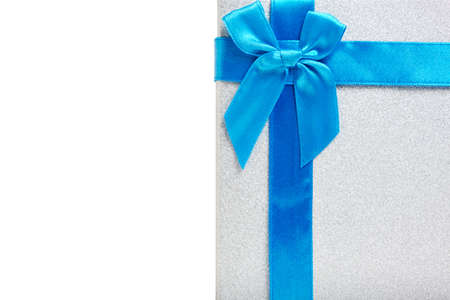 Gift box white background is tied with blue ribbon with bowの写真素材