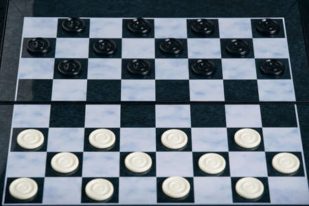 Background, checkers board with checkers, checkers is a logical game for two