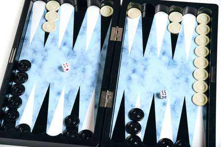 Board with cubes and chips for playing backgammon
