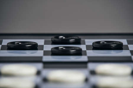 Background, checkers board with checkers, checkers is a logical game for two