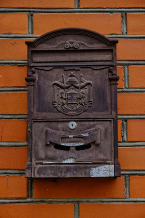 Old vintage mailbox on brick wallの写真素材