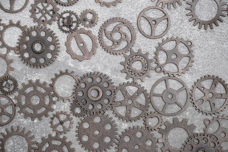 Abstract, gray concrete background with gears