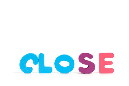 Word close is made multicolored letters white backgroundの写真素材
