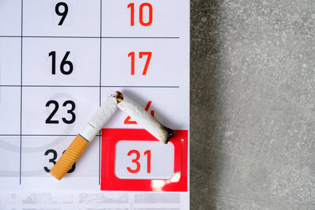 Extinguished Cigarette Lies Calendar with 31st Number marked.Concept for Tobacco free Day