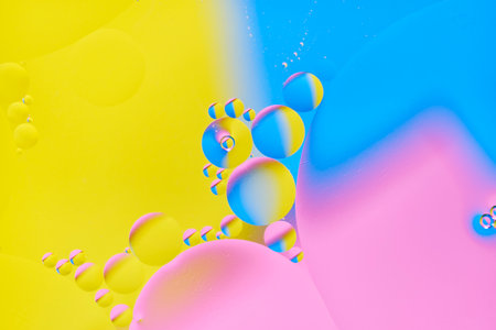 Bright abstract, multicolored background with oil circles