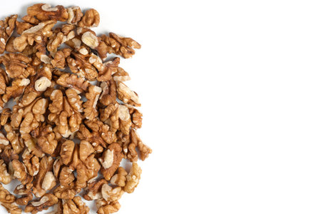 Lot peeled walnuts white background, isolateの写真素材