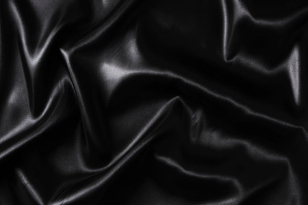 Silk fabric, abstract wavy black satin fabric backgroundの写真素材