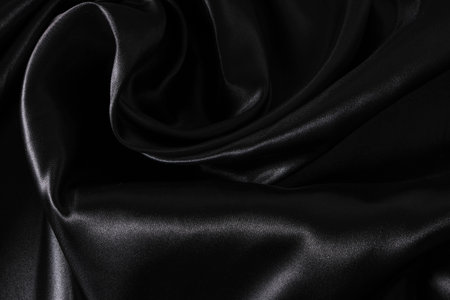Background black twisted silk fabric,abstract texture satin fabricの写真素材