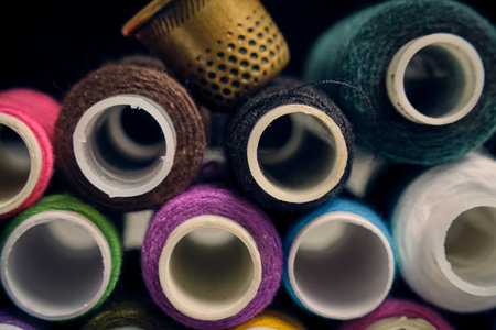 Thimble and set multicolored threads for cutting and sewing