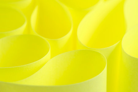 Abstract, yellow paper background with smooth linesの写真素材