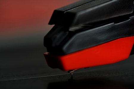 Needle of vinyl player is mounted on record. Closeup on macro photosの写真素材