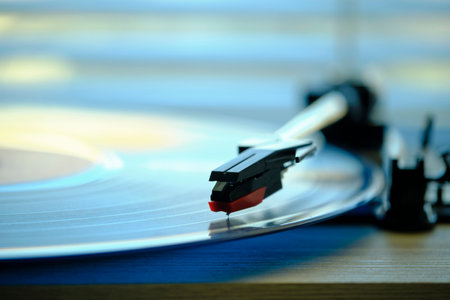 Vinyl record player with record on the background morning light from window with blindsの写真素材