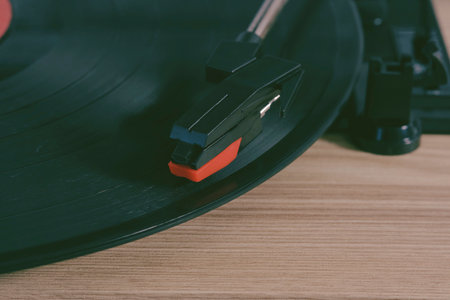 Classic vinyl record player closeup. Retro style.