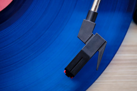 Gramophone record with needle for listening to music, top view