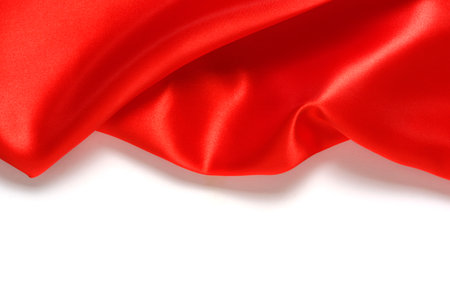 Red silk fabric white backgroundの写真素材