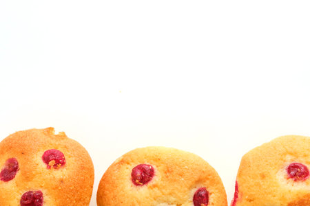 Fresh crumbly cookies with filling white backgroundの写真素材